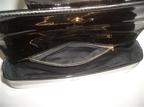 louis vuitton sobe clutch black|authentic black louis vuitton handbags.